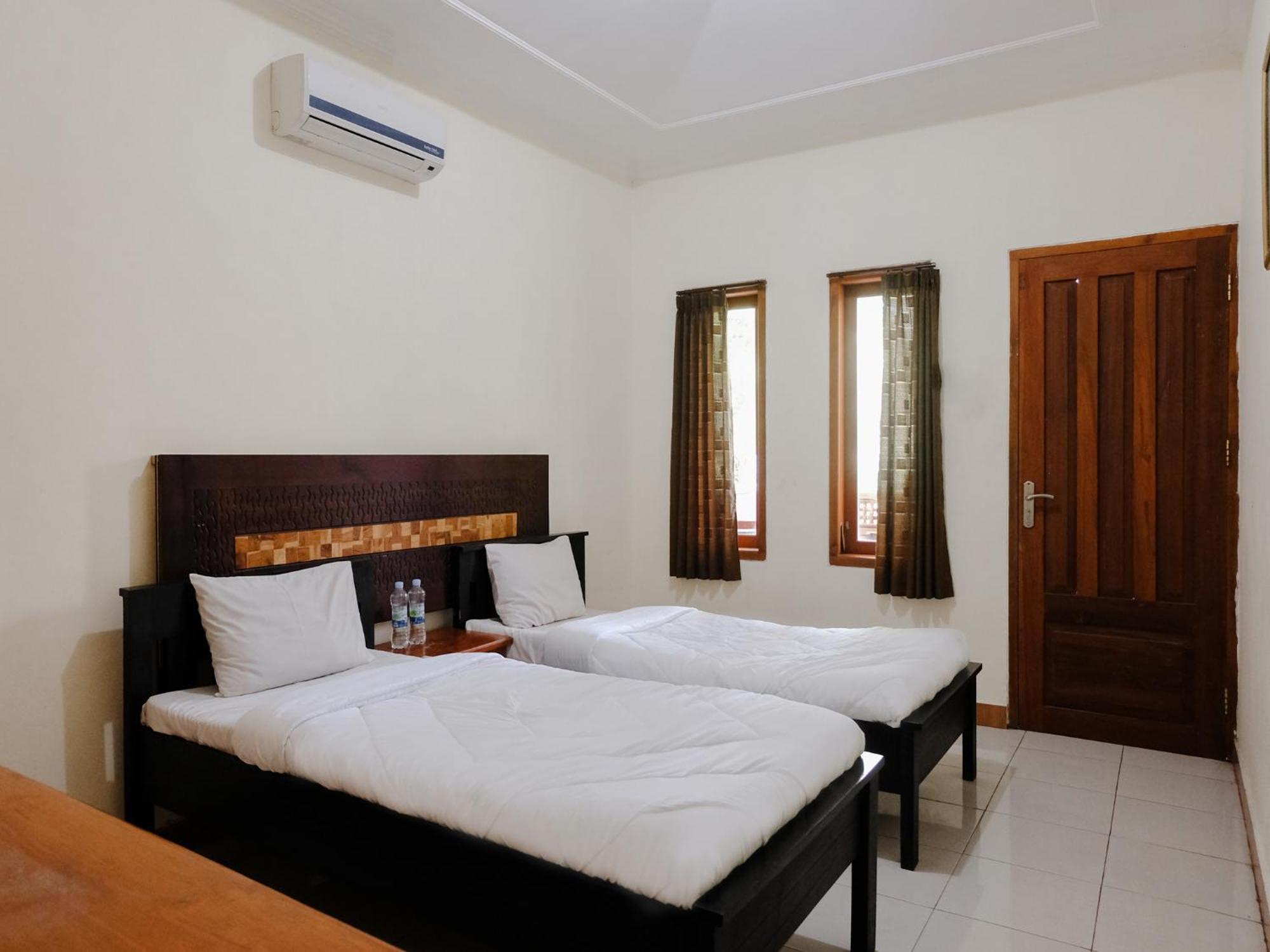 Hotel Mahkota Plengkung By Ecommerceloka バニュワンギ 部屋 写真