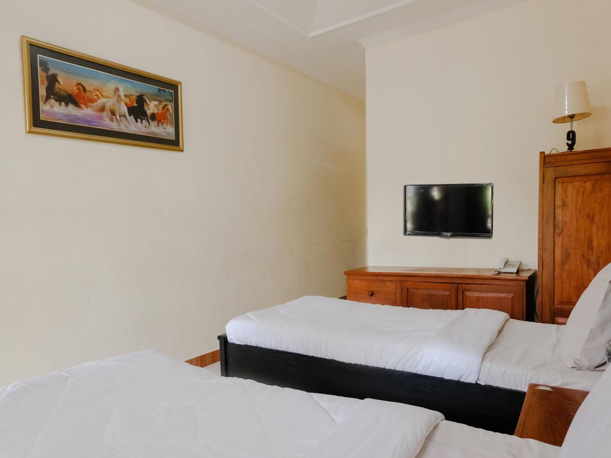 Hotel Mahkota Plengkung By Ecommerceloka バニュワンギ 部屋 写真